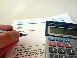 Tax Return | A person completing a tax return I am the desig… | Flickr