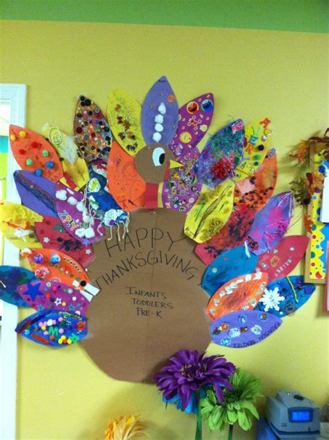 We send home a "feather" with each family to decorate. Then we create our turkey! | Feather ...