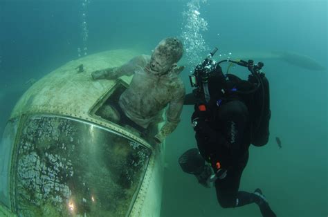 extracting corpse from underwater airplane wreck, training exercise : r/creepy