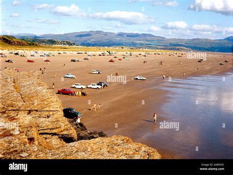 Cars on the beach near Porthmadog in Wales 1964 Stock Photo - Alamy