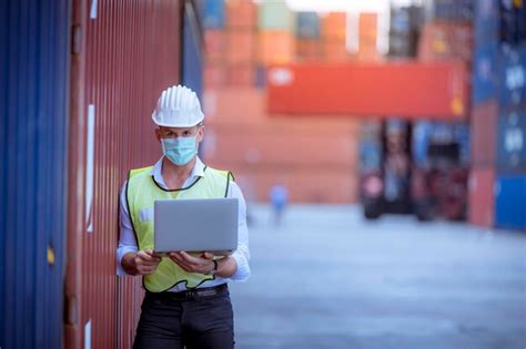 Premium Photo | Portrait team dock workers posing under working and ...