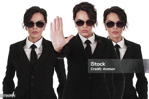 Three Female Secret Service Agents Stock Photo - Download Image Now - Bodyguard, Detective ...