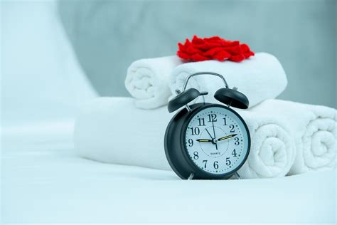 Wake up concept of black alarm-clock 1264066 Stock Photo at Vecteezy