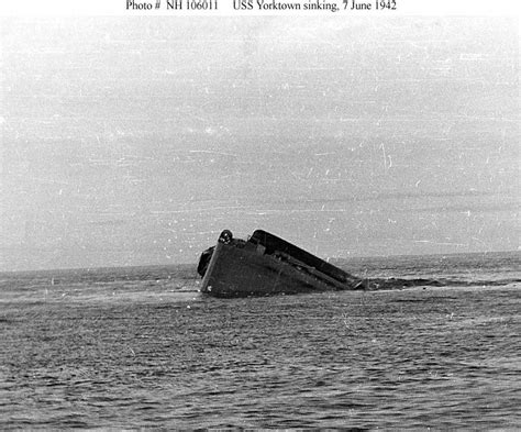 USS Yorktown (CV-5) sinking, just after dawn on 7 June 1942, as seen ...