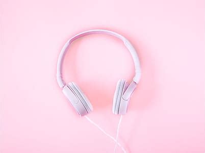 Royalty-Free photo: White Acer in-ear headphones | PickPik