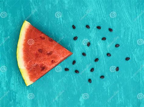 Triangle Watermelon Piece and Seeds on Aquamarine Background Stock ...