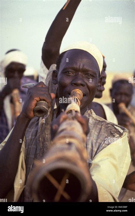 Sudanese musicians with wind instruments Stock Photo - Alamy