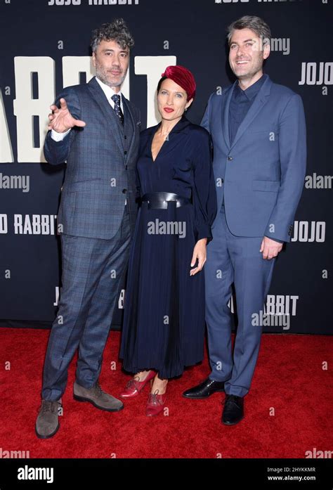 Taika Waititi, Chelsea Winstanley and Carthew Neal arriving at Fox Searchlight's JoJo Rabbit ...