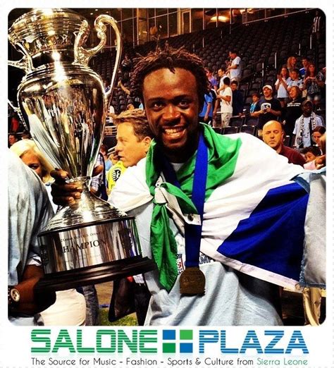 Kei Kamara proudly displaying the Sierra Leone flag after winning the ...