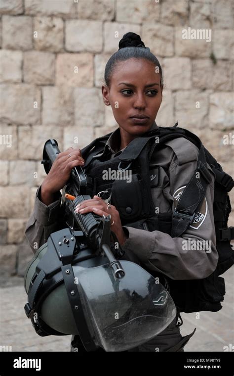 An armed Israeli border policewoman from the Beta Israel community also ...