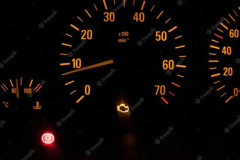 Premium Photo | Tachometer machine Lit Check Engine