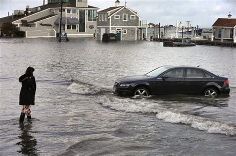 Heavy rains bring flooding to coastal and river areas in New England ...