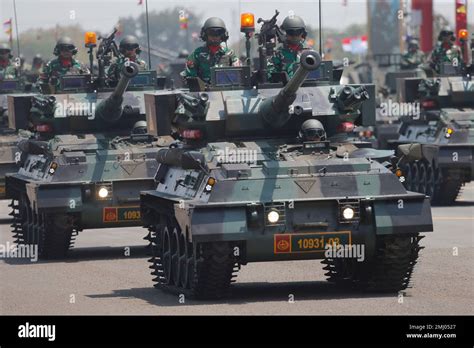 Indonesian soldiers parade on tanks march during a parade marking the ...