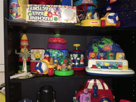 Pony Candle Carousel (Far left, second row, in front of Stacking Clown by Brio) | Baby einstein ...