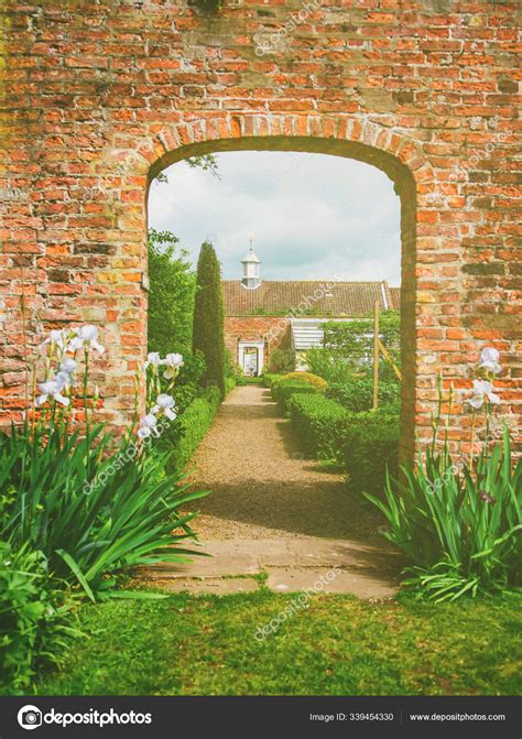 Old manor and its garden in York in England UK — Stock Photo © erix2005 #339454330