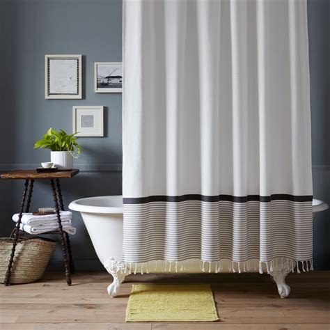 Striped and tasseled shower curtain from West Elm - Decoist