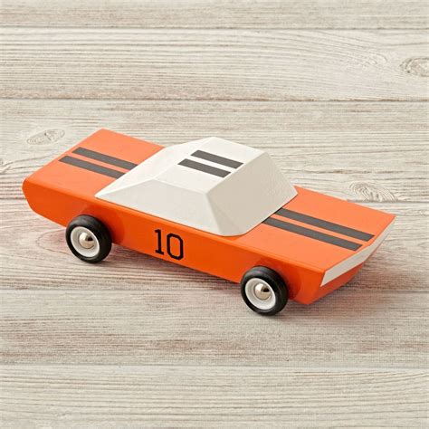 Inspired by the classic racecars, this wooden toy car is a throwback to the old-school, retro ...
