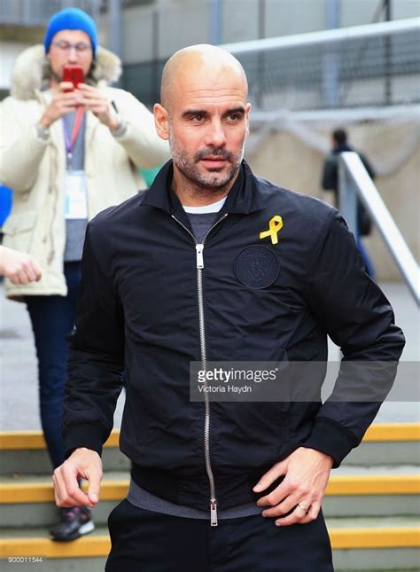 Josep Guardiola, Manager of Manchester City looks on prior to the Premier League match between ...