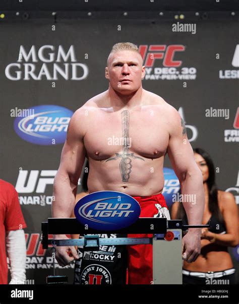 UFC fighter Brock Lesnar arrives at the weigh-ins for UFC 141 at the ...