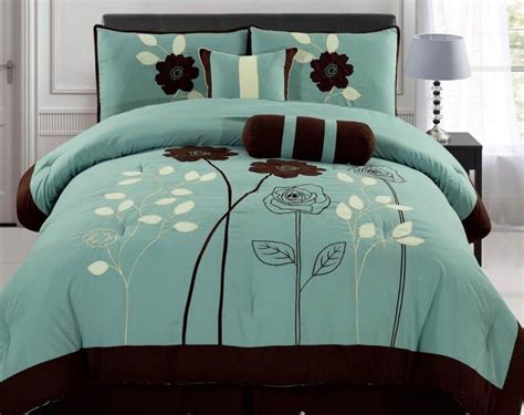 brown flower on teal bedding of A Welcome Comfort from Teal and Gray Bedding | Grey and teal ...