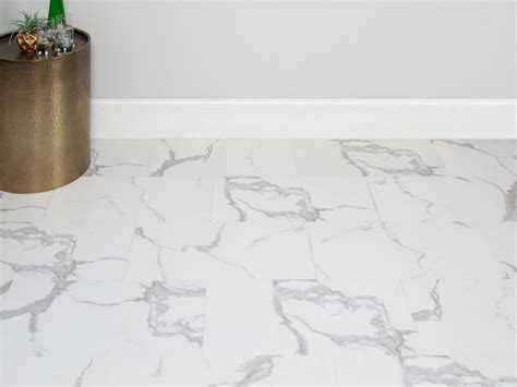 Carrara Marble Rigid Core Luxury Vinyl Tile - Cork Back | Floor and Decor