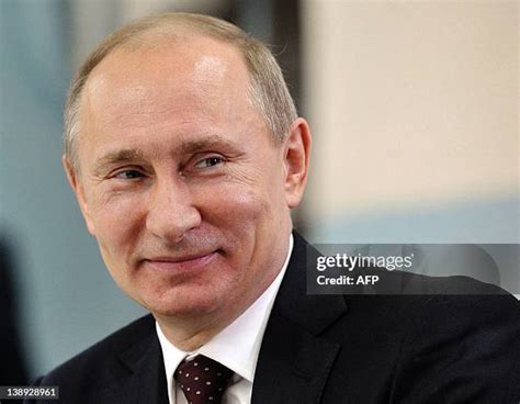 Putin Smiling Photos and Premium High Res Pictures - Getty Images