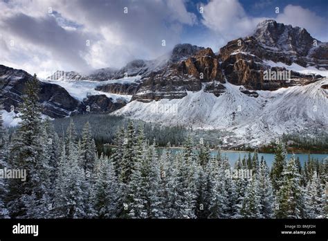 Mount Crowfoot & the Crowfoot Glacier above Bow Lake in the snow, Icefields Parkway, Banff ...