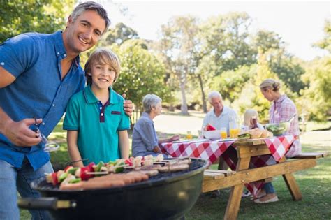 Premium Photo | Happy family having picnic in the park