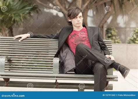 Stylish Man Sitting on a Bench Stock Photo - Image of modern ...
