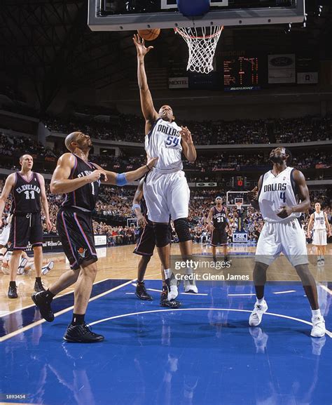 Popeye Jones of the Dallas Mavericks takes the shot against Carlos... News Photo - Getty Images