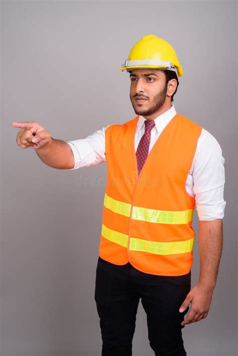 Portrait Of Indian Man Construction Worker Businessman Pointing Finger Stock Photo - Image of ...
