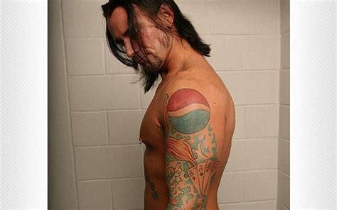 Why does CM Punk have a Pepsi tattoo?