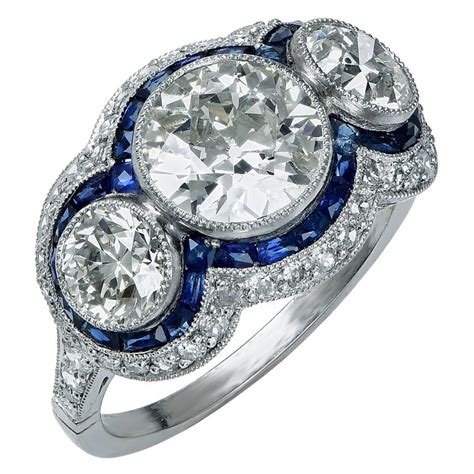 3.74 Carat Diamond Sapphire Platinum Three Stone Ring at 1stDibs