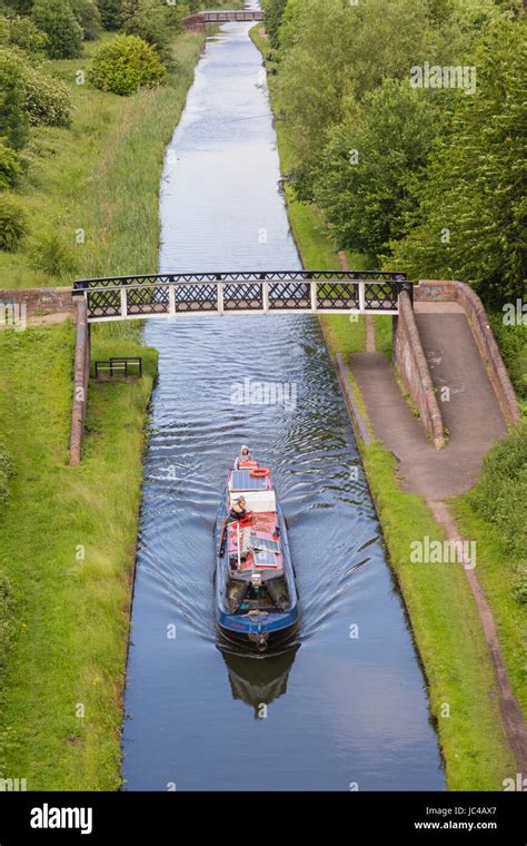 Canal boat travelling on the Birmingham to Wolverhampton canal, West Midlands Black Country ...