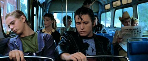 The bus scene in The Outsiders (1983) features a man reading the ...