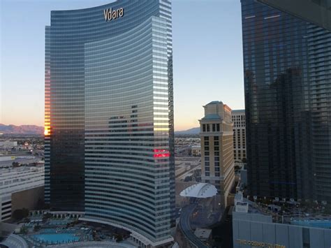 the las vegas hotel and casino towers are lit up at sunset