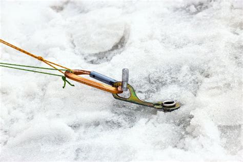 Ice Piton Screwed into Ice with Belaying Ropes and Carabiner Stock Image - Image of winter ...