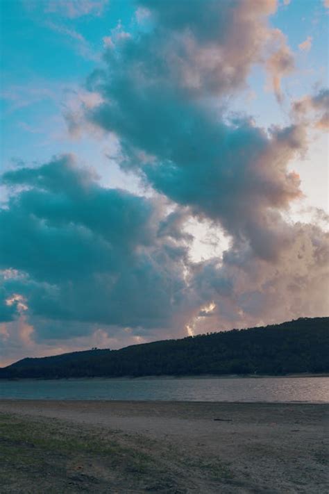 White Clouds over Mountain · Free Stock Photo