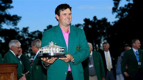 2018 Masters champion Patrick Reed poses with the Masters Tournament Trophy during Green Jacket ...