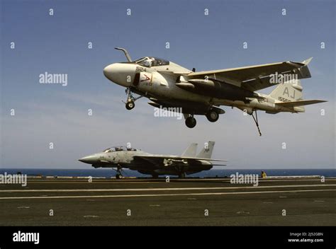 US Navy, deck-landing of a Grumman A-6 Intruder strike aircraft on Nimitz aircraft carrier (May ...