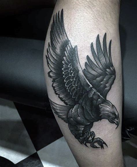 Accurate designed black and white flying eagle tattoo on leg ...