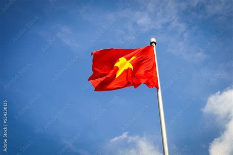 communist flag of Vietnam flutters Stock Photo | Adobe Stock