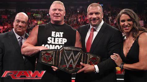 Brock Lesnar receives the new WWE World Heavyweight Championship: Raw ...