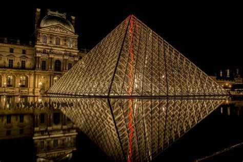 Louvre Pyramid at night editorial photography. Image of night - 14158462