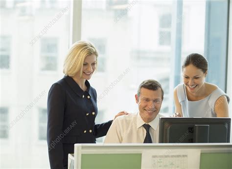 Business people talking in office - Stock Image - F014/1441 - Science Photo Library