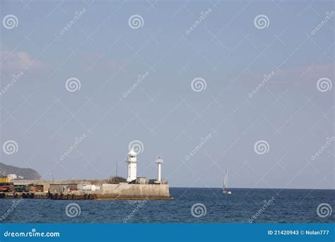 Lighthouse in the port stock image. Image of protection - 21420943