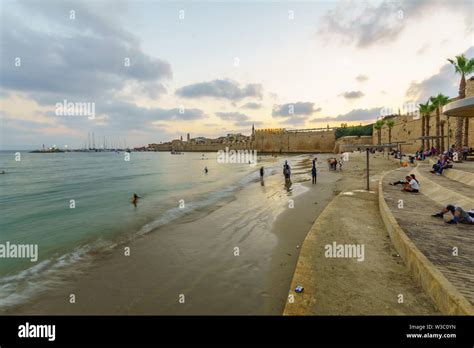 Acre, Israel - July 08, 2019: Sunset view of the Horses beach, the sea ...