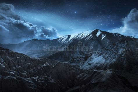 Beautiful Landscape Snow Mountains at Night on Blue Cloud and Star Background. Leh, Ladakh ...