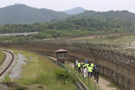 North Korean gymnast jumps border fence to freedom in South Korea ...