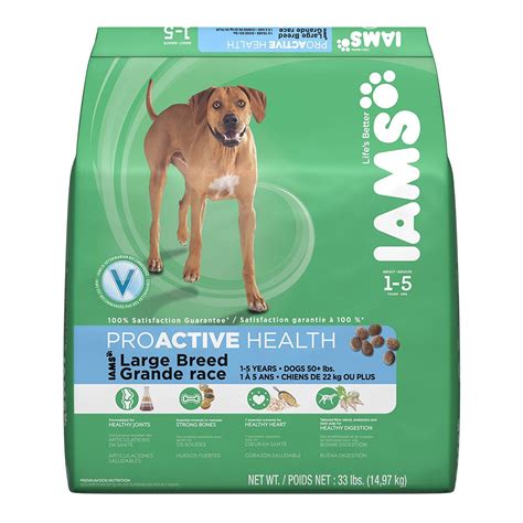 a dog standing in front of a bag of paws proactive health large breed puppy food